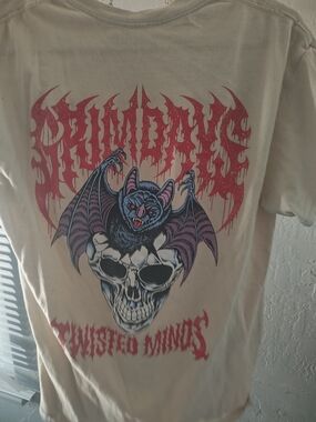 Twisted Cream Graphic Tee with Pink and Blue Bat Skull Artwork